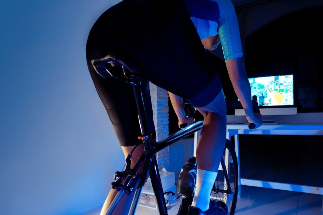 Spin bike sessions done at home in front of a screen are one of the innovations in the fitness industry that have helped people to exercise despite Covid-19 lockdowns and the closure of gyms. Photo: Getty Images