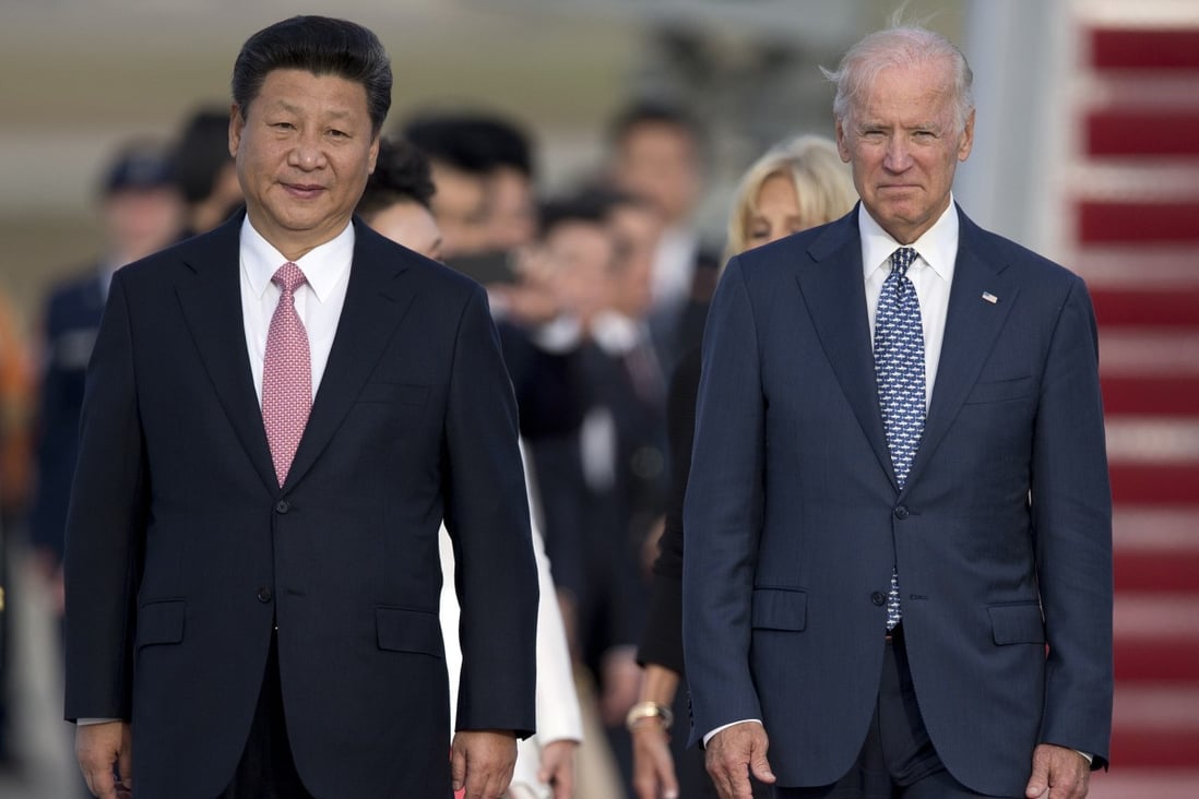 Chinese President Xi Jinping and then US vice-president Joe Biden walk down the red carpet on the tarmac at Andrews Air Force Base in Maryland in September 2015. Photo: AP