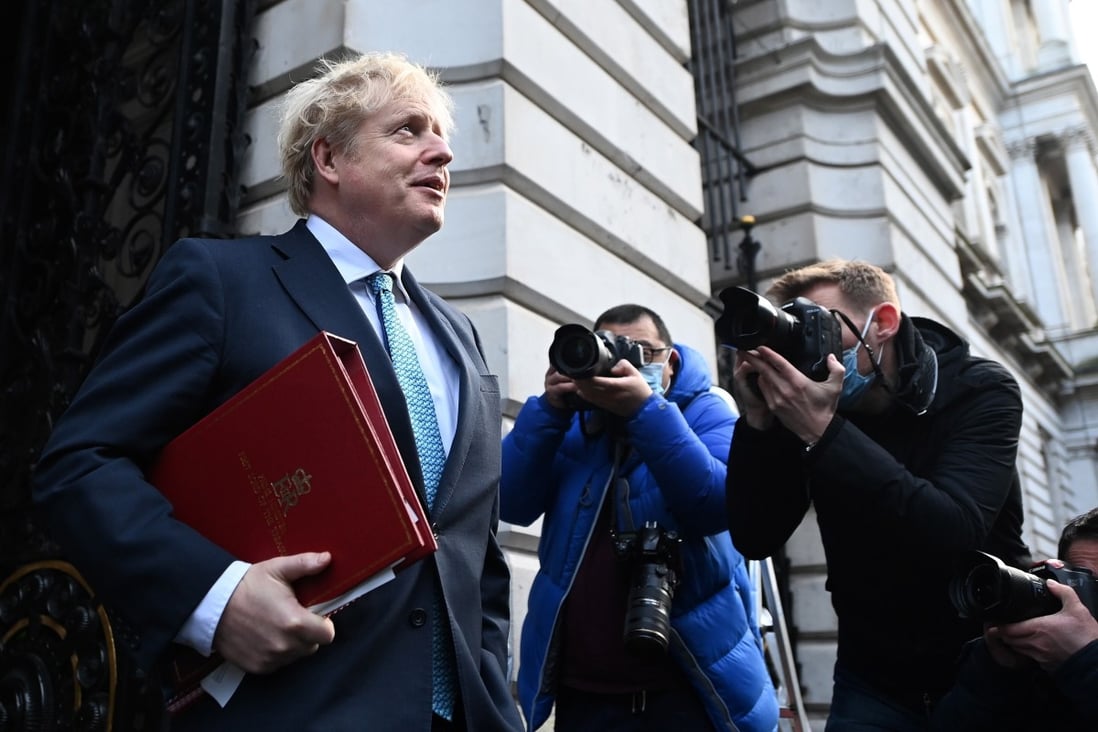 British Prime Minister Boris Johnson, shown leaving 10 Downing Street on Tuesday, has invited India, South Korea and Australia to take part in the G7 summit meeting next year. Photo: EPA-EFE