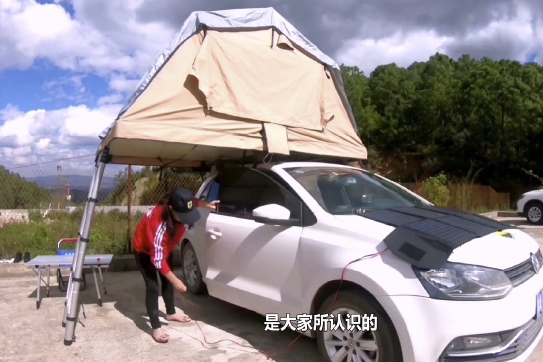 To save money, Su Min sleeps in a tent on top of her car at night. Photo: Weibo/Su Min