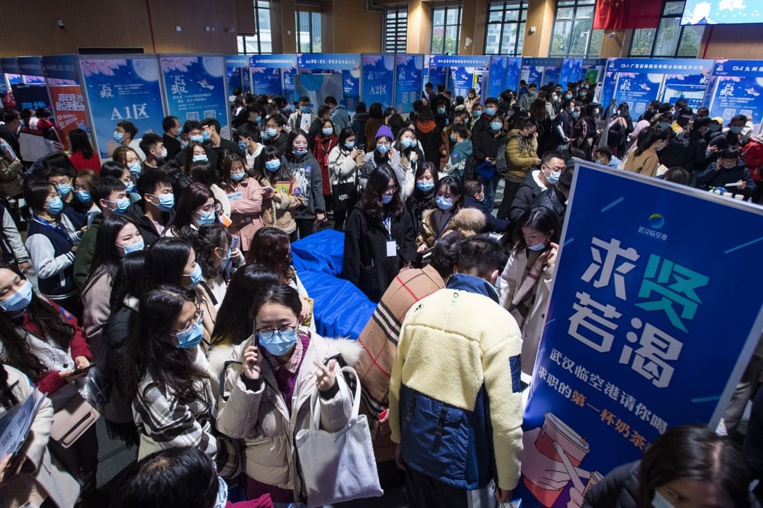 People attend a job fair at the Hongshan Gymnasium in the central Chinse city of Wuhan. Photo: Xinhua