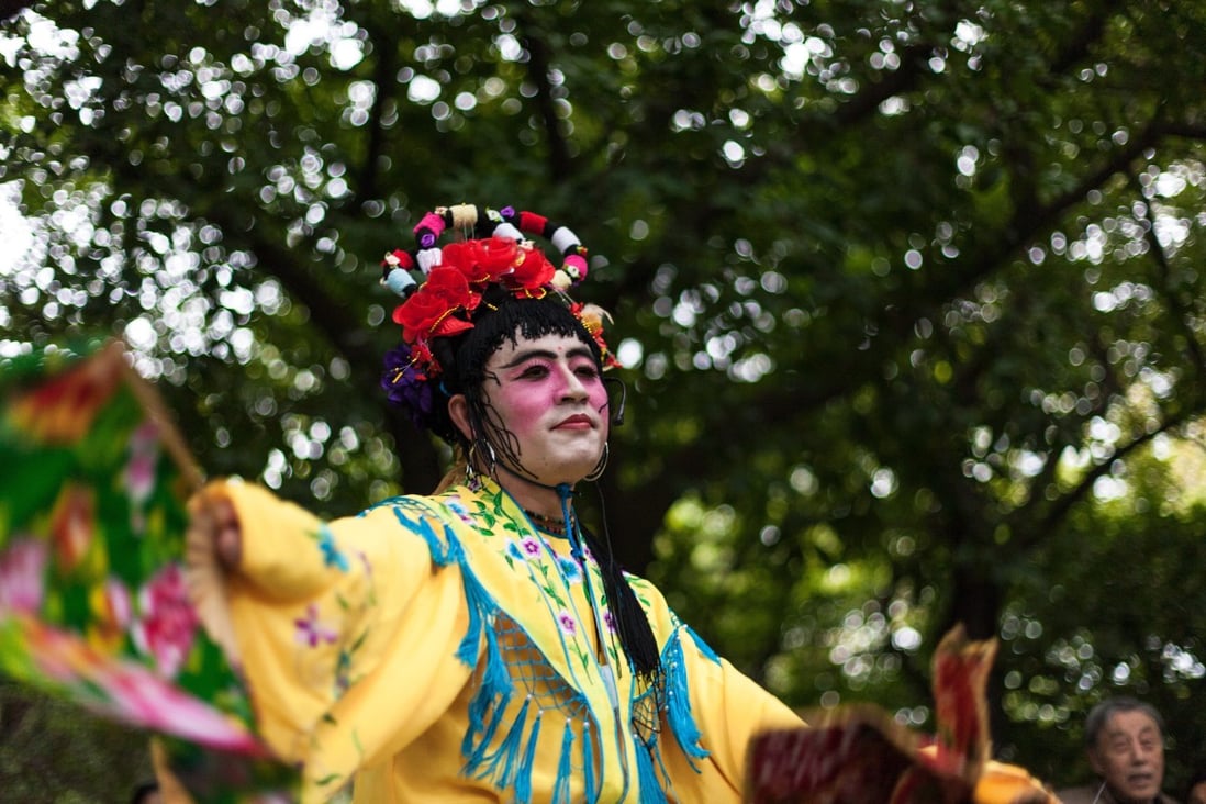 A transgender woman dances in Lianhuashan Park. Shenzhen. While China doesn’t recognise LGBTQ people, and restricts freedom of expression about LGBTQ people, same-sex couples find ways to gain legal protection, a global report notes. Photo: Emeric Fohlen/NurPhoto via Getty Images