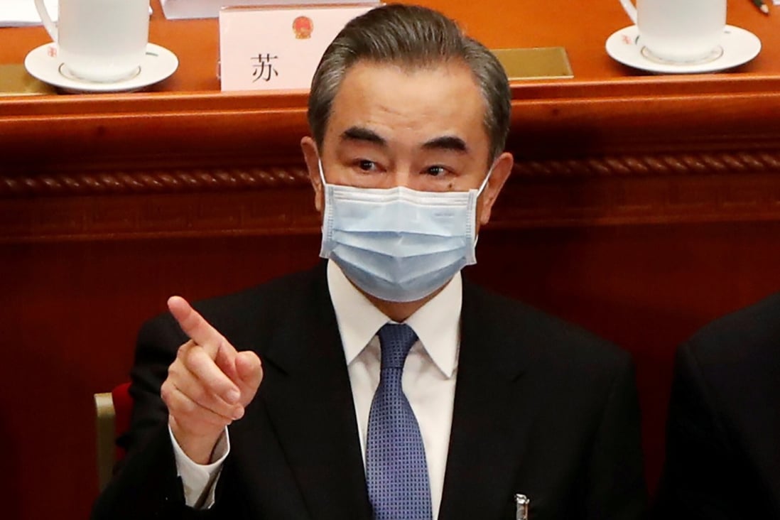 Chinese Foreign Minister Wang Yi, shown in May, said on Monday that the US should rejoin the Iran nuclear deal and “scrap all sanctions imposed on Iran, other third-party entities and individuals”. Photo: Reuters