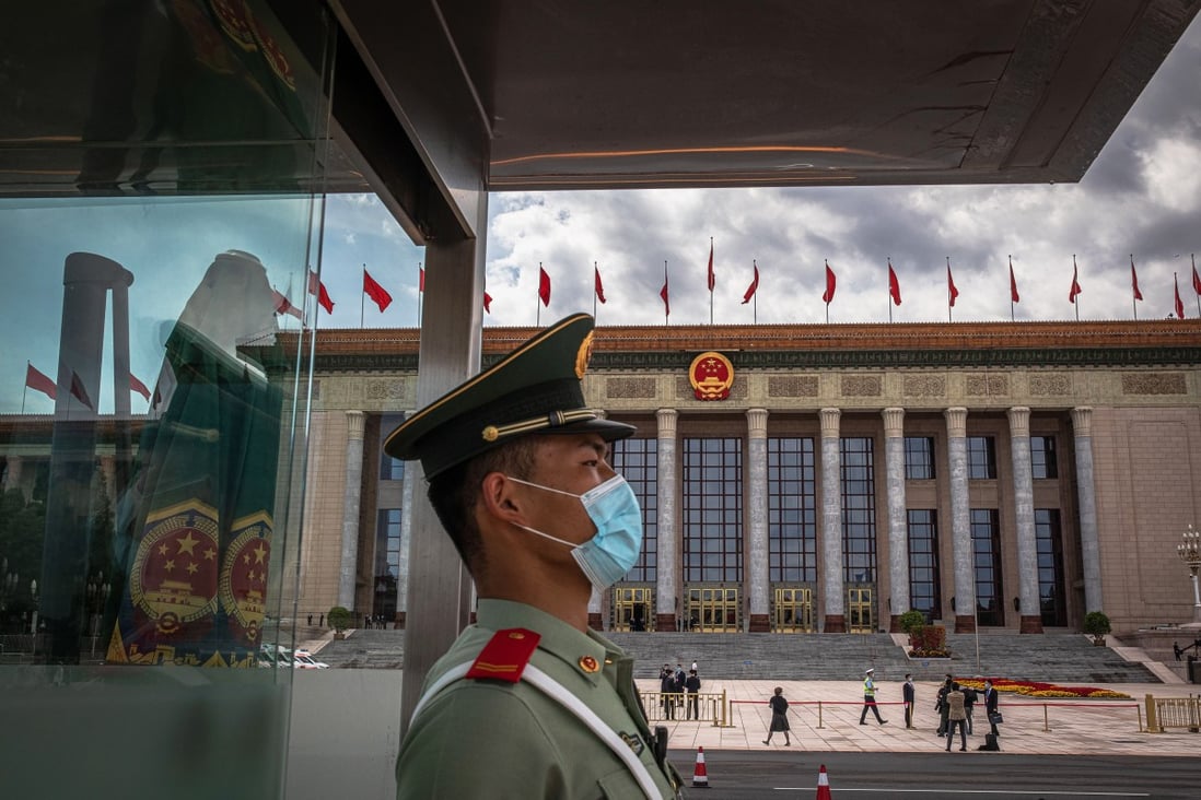 A Chinese soldier stands outside the Great Hall of the People in Beijing. Photo: EPA-EFE