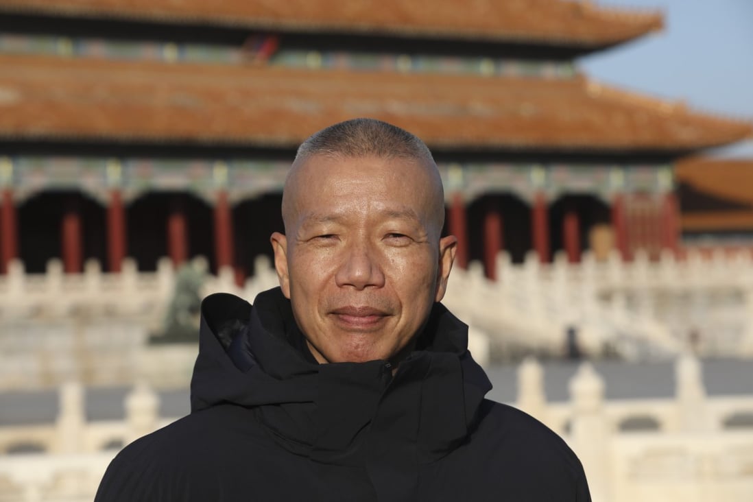 Chinese artist Cai Guoqiang outside the Palace Museum in Beijing, China, where his new show, “Odyssey and Homecoming”, is being held. Photo: Simon Song