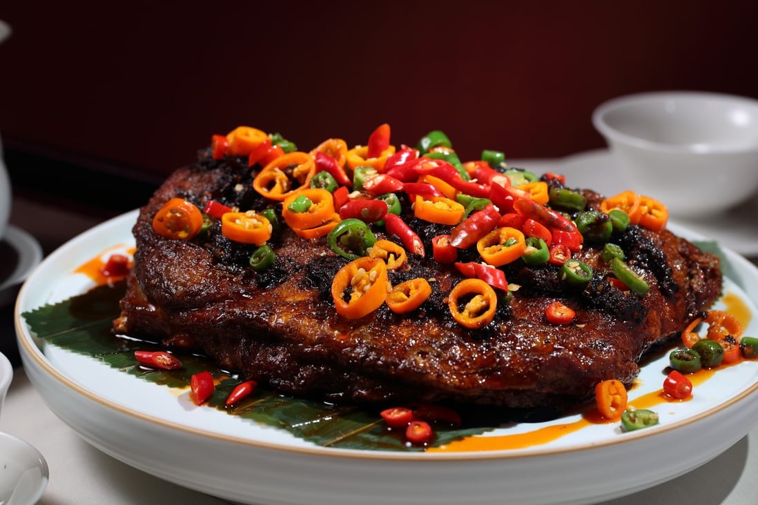 Fried Hulunbuir mutton spare ribs with home-made Sichuan chilli sauce at Dong Lai Shun. Photo: Alex Chan