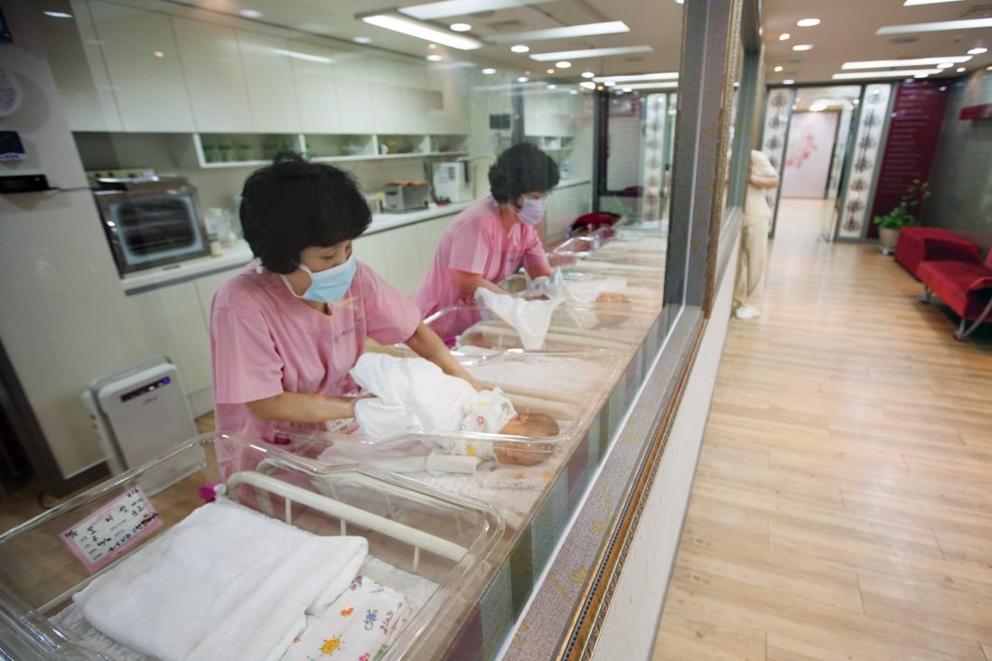 Nurses taking care of newborns at a birthing care centre in Seoul. Photo: SCMP