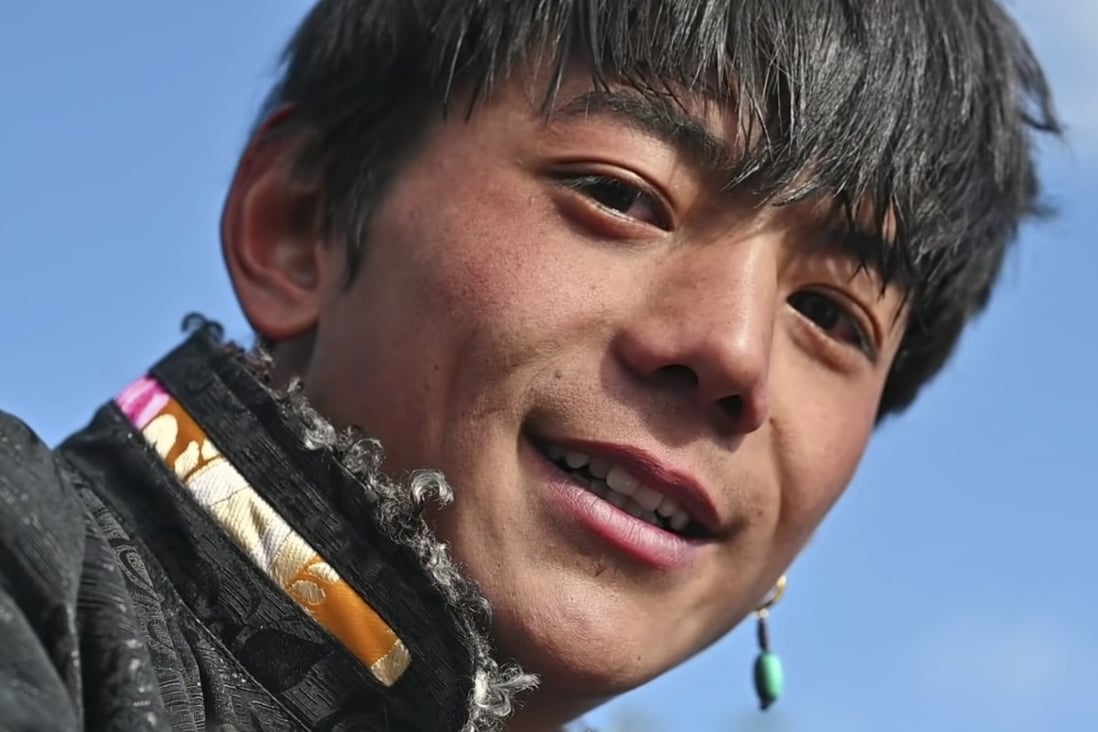 Tibetan herdsman Zhaxi Dingzhen became a symbol for China’s war on extreme poverty when a video featuring him went viral. Millions of people were captivated by his smile and good looks. Photo: YouTube