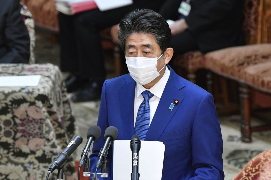 Former prime minister Shinzo Abe speaks during a House of Representatives committee session in Tokyo on Thursday about allegations his camp illegally paid for dinner receptions attended by his supporters. Photo: Kyodo