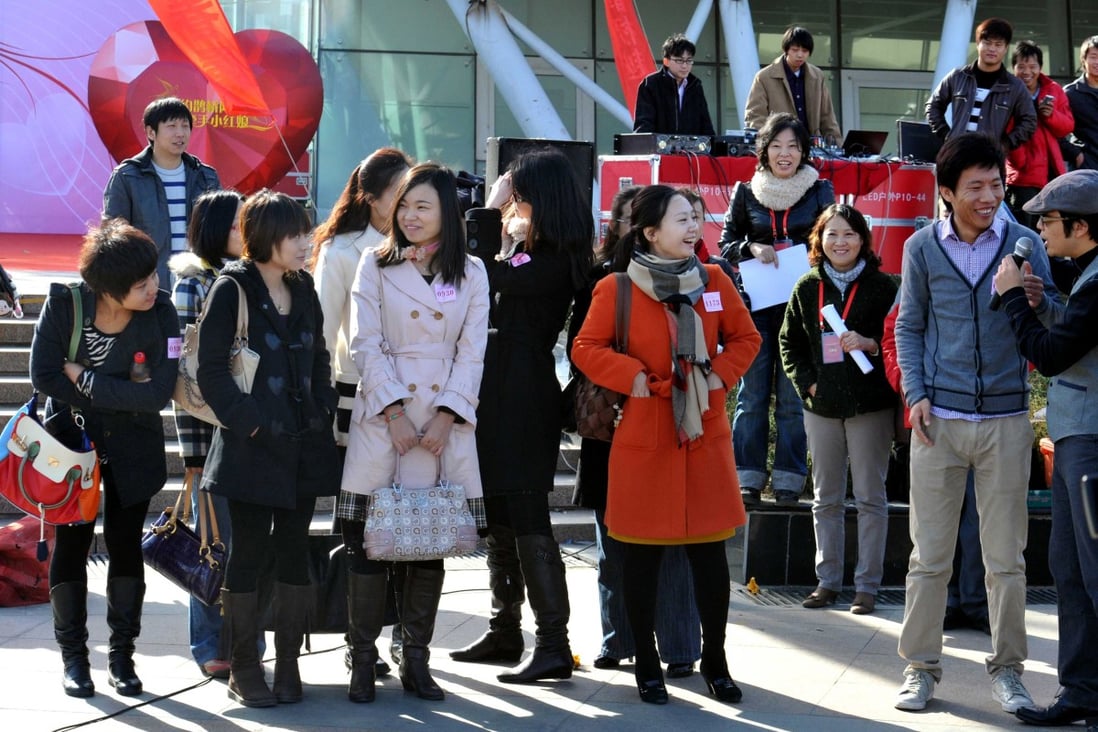 Thousands of Chinese singles take part in a matchmaking fair for employees from China's state-owned companies, in Beijing, in November 2011. Photo: Getty Images