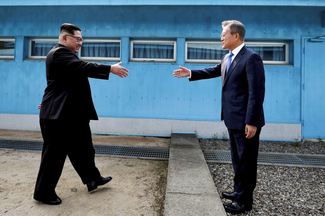 North Korean leader Kim Jong-un and South Korean President Moon Jae-in meeting in the demilitarised zone in 2018. Photo: Reuters