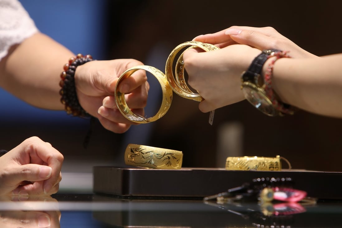 Less Hongkongers have bought gold jewellery this year as the pandemic has ruined wedding plans and other celebrations. Photo: Winson Wong