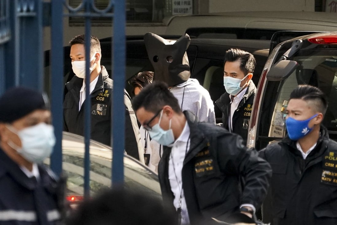 One of two teenage fugitives mainland Chinese authorities decided not to prosecute arrives at Hong Kong’s Tin Shui Wai police station. Photo: Felix Wong
