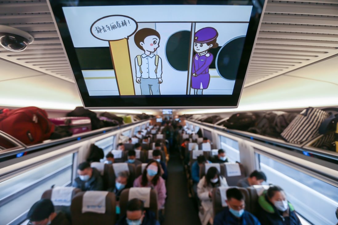 A promotional video about the quiet carriage is played on a Beijing-Shanghai high-speed train, which links the two cities in China. Photo: Wang Xiang