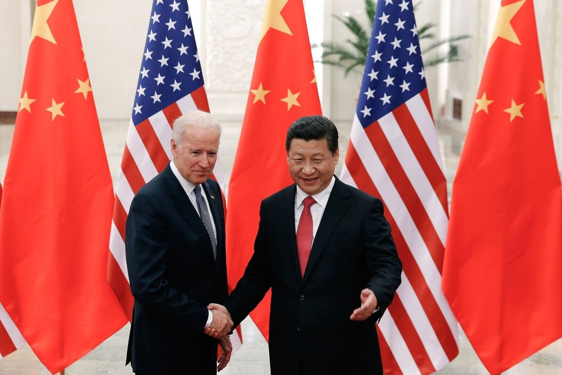 Joe Biden pictured with Xi Jinping on a visit to Beijing in 2013. Photo: AFP