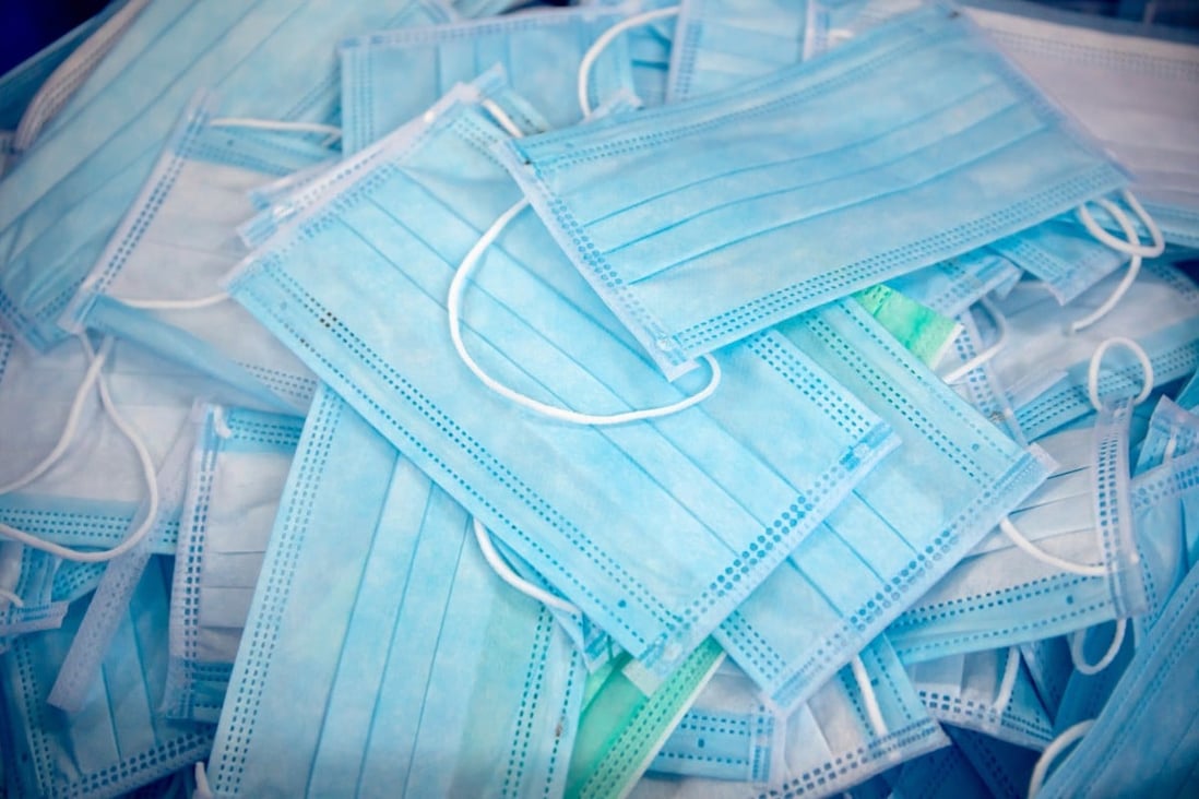 Some business owners predict people will still wear masks for the next couple of years, even with vaccines against Covid-19. Photo: Bloomberg