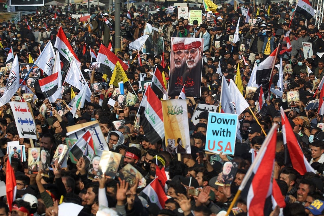 Iraqi demonstrators rallied in Tahrir Square in Baghdad on January 3 to mark one year after a US drone strike killed Iran's revered Quds Force commander, General Qassem Soleimani, and his Iraqi lieutenant, Abu Mahdi al-Muhandis, near Baghdad International Airport. Photo: AFP