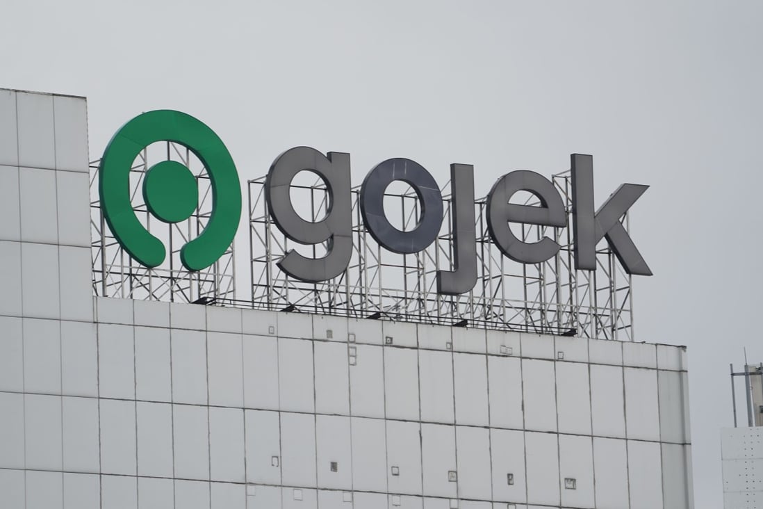 The Gojek sign is seen on the company's building in Jakarta, Indonesia. The ride-hailing and payments giant is reportedly in advanced discussions about merging with local e-commerce pioneer Tokopedia. Photo: Bloomberg