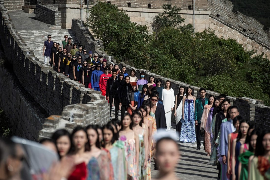 Models walk along the Great Wall of China during the Pierre Cardin China Legend 40th Anniversary Fashion Show on the outskirts of Beijing in 2018. French fashion designer Cardin was revered in China. Photo: AFP