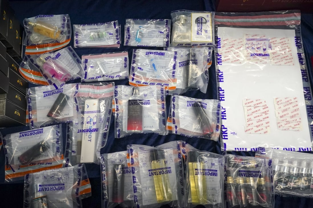Hong Kong police seized about 800 bottles of suspected liquid date-rape drug and impotence medication. Photo: Felix Wong