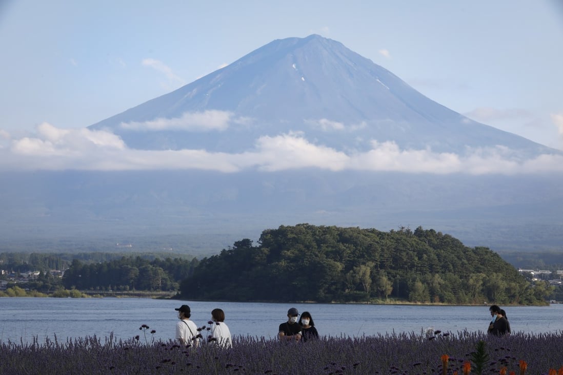 Mount Fuji looms over Lake Kawaguchi, about 100km west of Tokyo. Photo: EPA-EFE