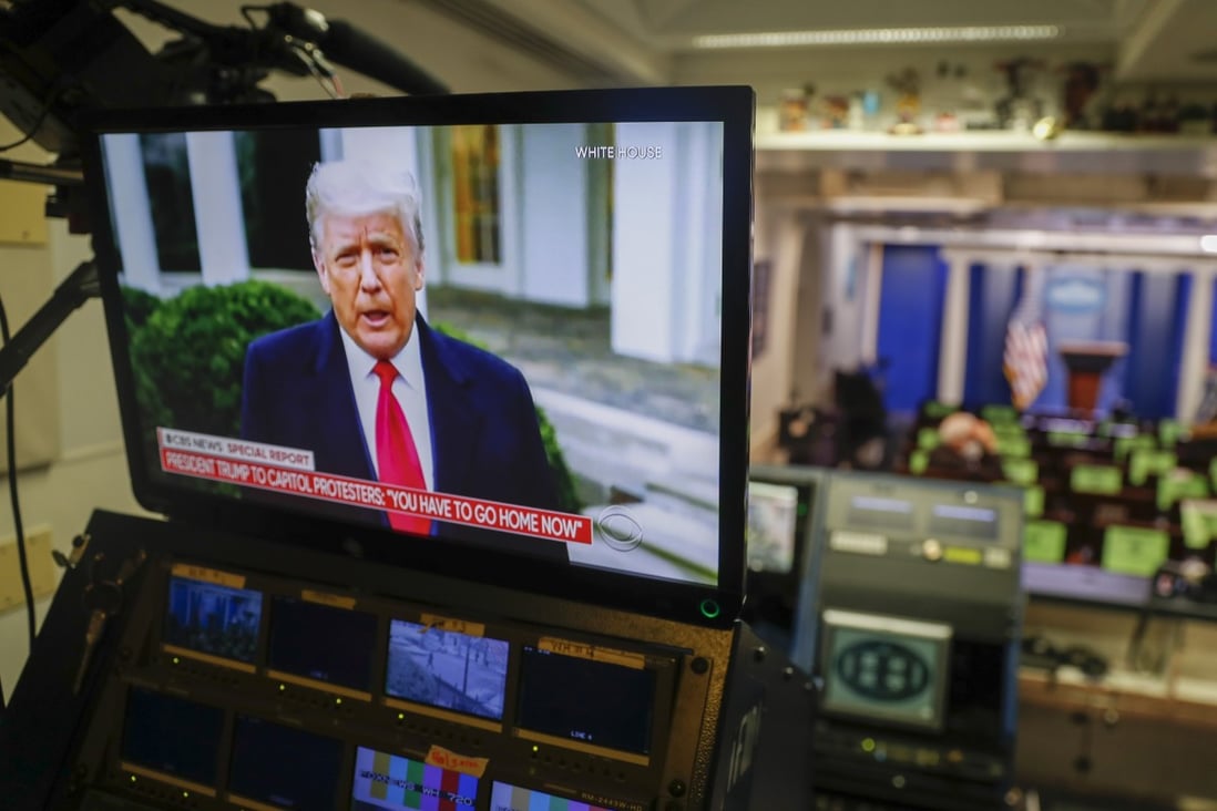 US President Donald Trump is seen delivering remarks via Twitter about the violence at the US Capitol on a television screen in the Brady press briefing room at the White House in Washington on Wednesday. Photo: EPA-EFE