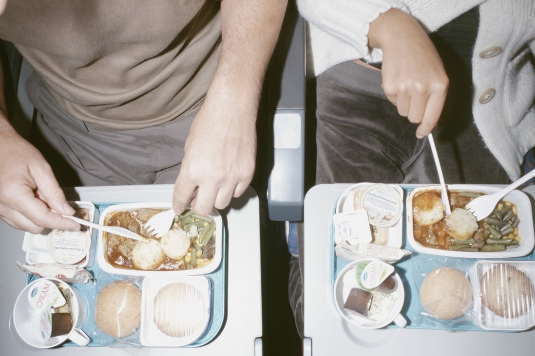 Airlines are tackling the problem of food waste on flights by asking travellers to opt out of meals before they fly and by using artificial intelligence to analyse and predict in-flight food consumption. Photo: Getty Images