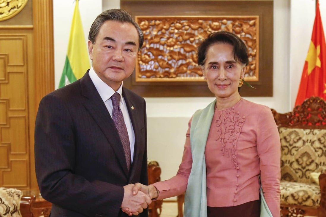Chinese Foreign Minister Wang Yi with Myanmar’s Aung San Suu Kyi during a previous visit. Photo: Xinhua