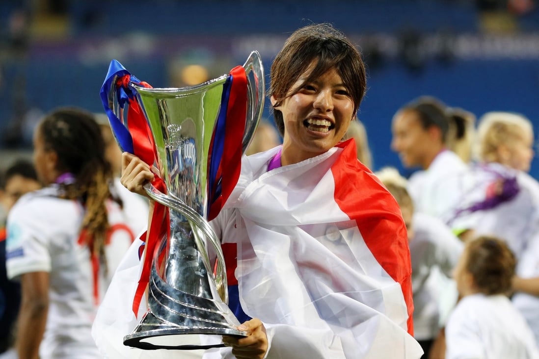 Japan’s Saki Kumagai celebrates with the Uefa Women’s Champions League trophy after the final. Photo: Reuters