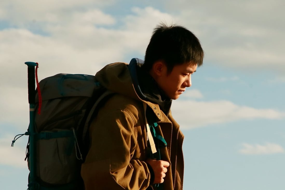 Jackson Yee in a still from A Little Red Flower, directed by Han Yan and also starring Liu Haocun.