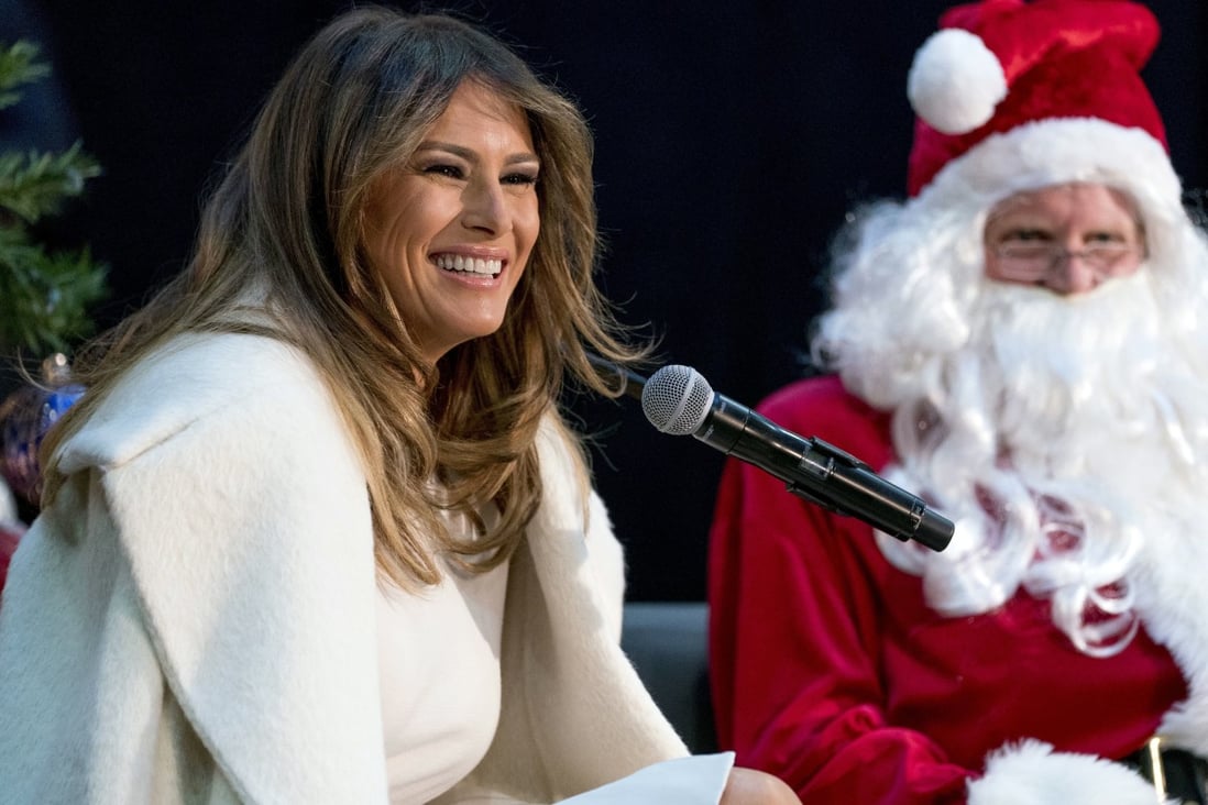 First lady Melania Trump, accompanied by Santa Claus, takes questions from children at Washington’s Children's National Medical Center in December 2017. Photo: AP Photo