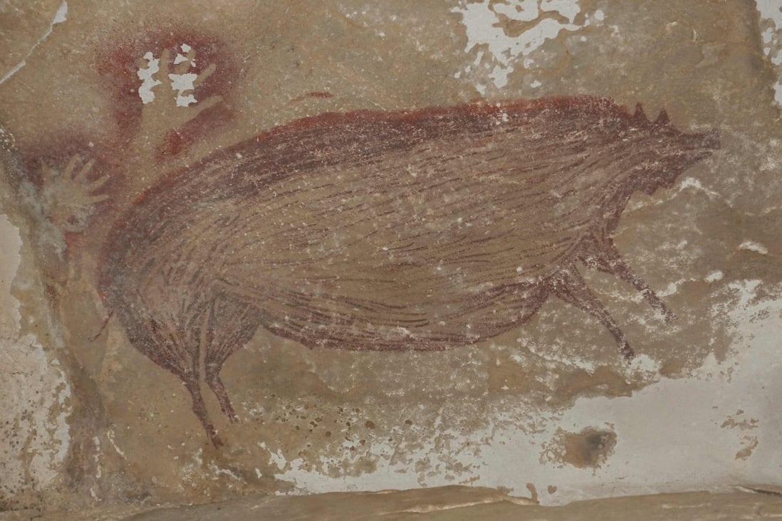 The painting was made at least 45,500 years ago in Indonesia. Photo: Griffith University / AFP