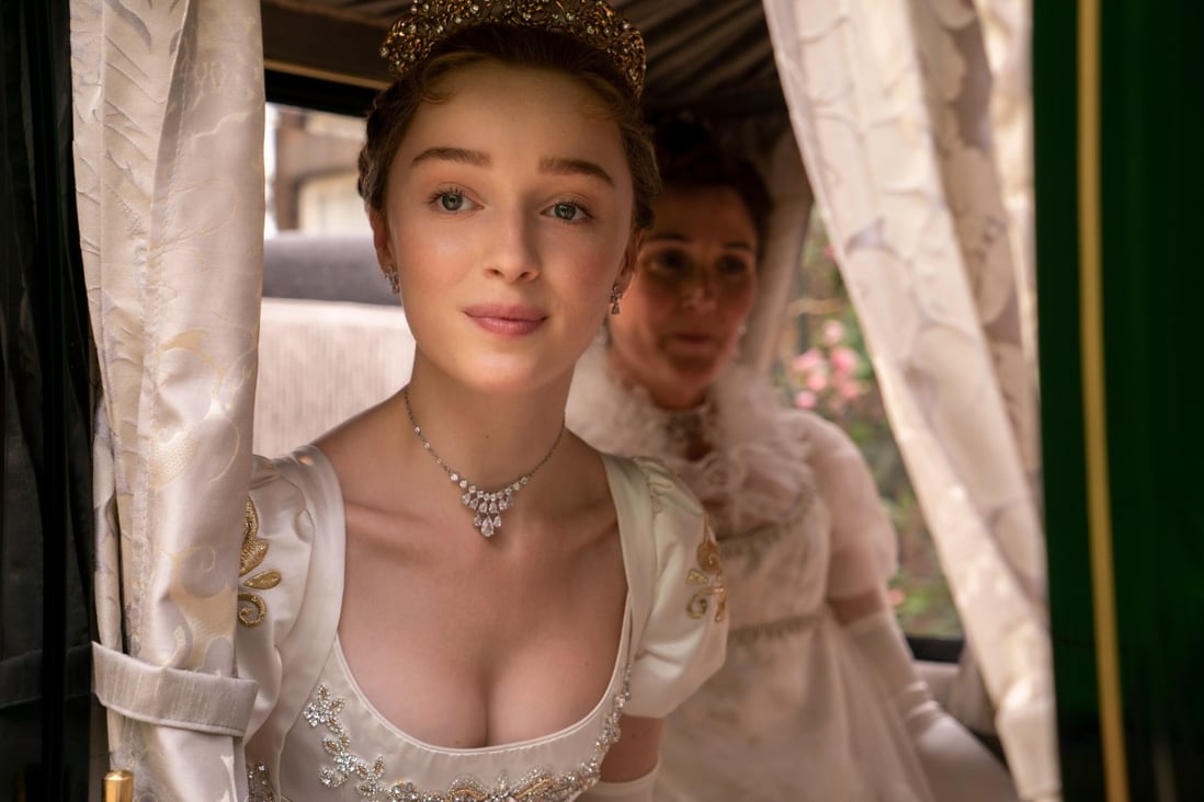 Actresses Phoebe Dynevor and Ruth Gemmell show off the remodelled Regency look of some of the 7,500 costumes used in Netflix series Bridgerton. Photo: Netflix
