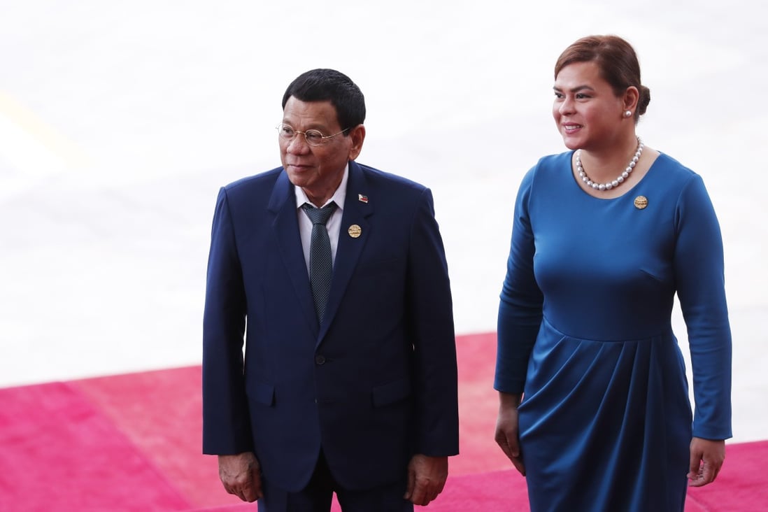 Philippine President Rodrigo Duterte, left, advised his daughter, Sara Duterte-Carpio, right, not to run for president. Photo: AFP