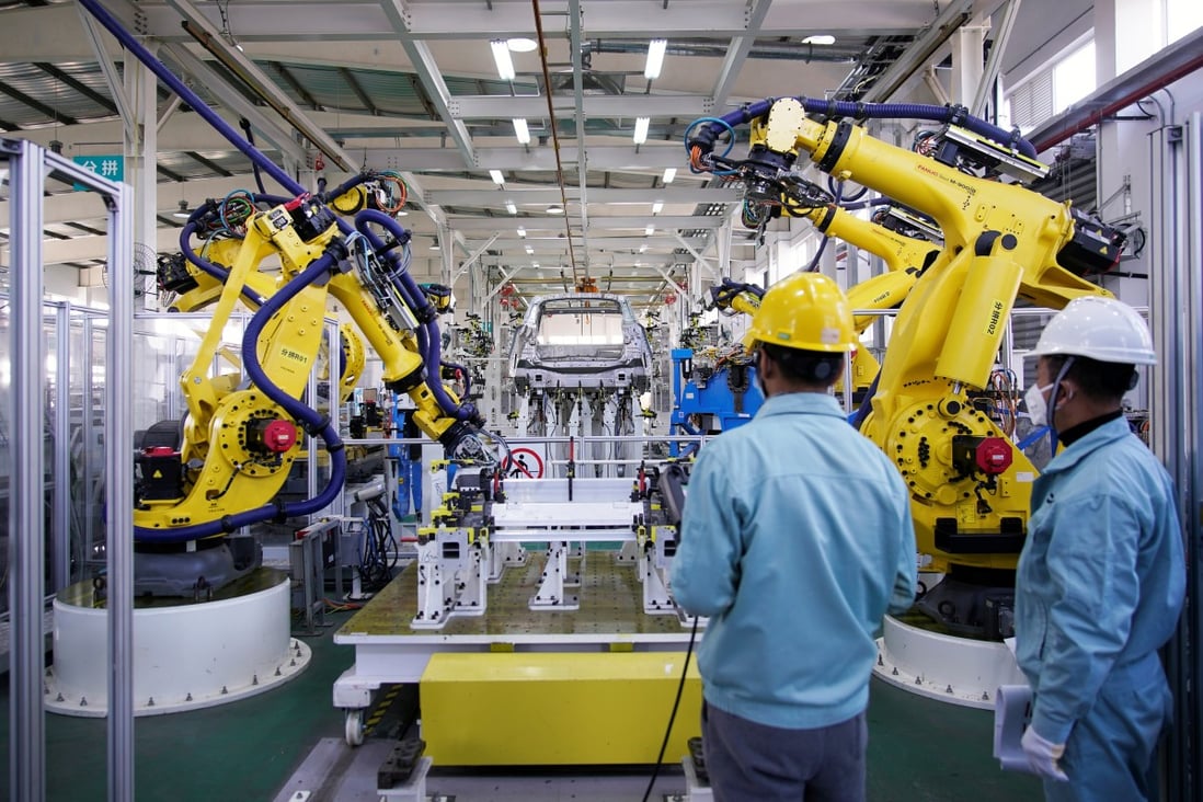 China’s official manufacturing purchasing managers’ index (PMI), a leading indicator measuring sentiment among factory owners, showed sector activity expanded for the 10th straight month in December, although its reading eased by 0.2 points from November to 51.9 last month. Photo: Reuters