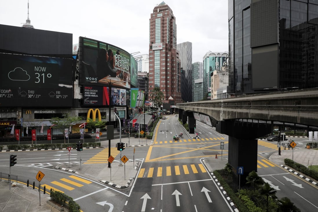 Deserted roads in Kuala Lumpur after a lockdown and state of emergency were imposed to curb the spread of Covid-19. Photo: Reuters