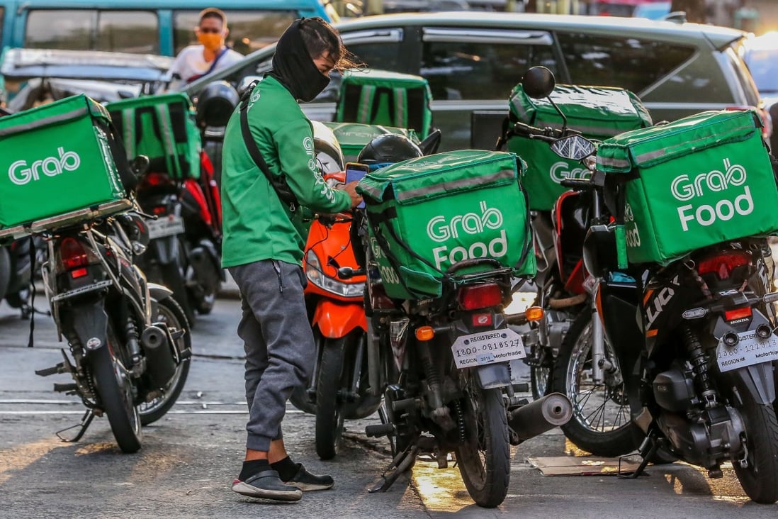 A driver prepares to deliver food in Makati, the Philippines, on May 1, 2020. Grab expanding its services by delivering users’ orders from wet markets is one example of digital innovation in Southeast Asia during the pandemic. Photo: Xinhua