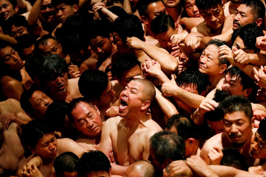 Men prepare to take part in the Naked Man Festival at Saidaiji Temple in Okayama, Japan. Photo: Reuters