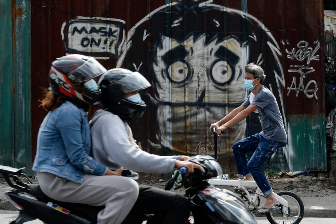A mural reminds people to wear masks in Caloocan City, Metro Manila, Philippines. Photo: Reuters