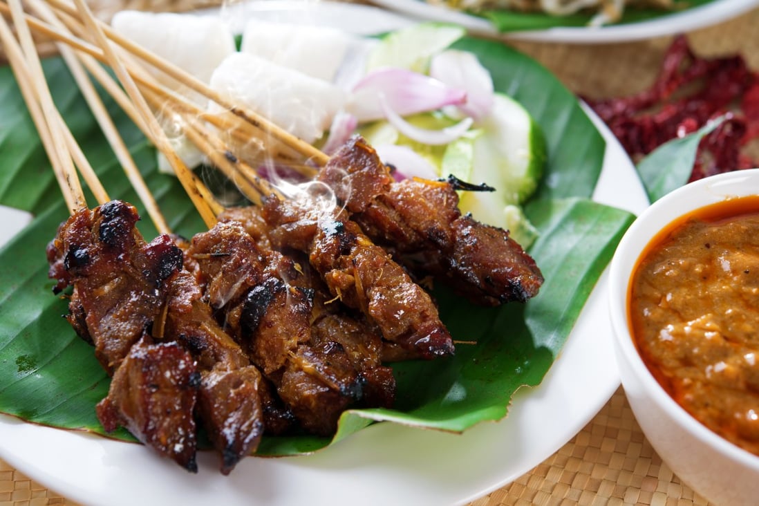 Nonya Cooking: The Easy Way, by Terry Tan, includes recipes for dishes such as beef satay. Photo: Shutterstock