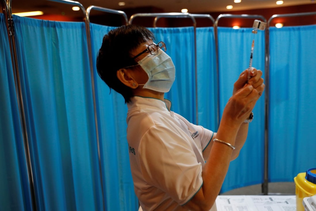 A nurse prepares to vaccinate health care workers at Singapore’s Gleneagles Hospital on January 19. Singapore’s sovereign wealth fund Temasek invested in BioNTech and has supported its efforts to develop a vaccine. Photo: Reuters