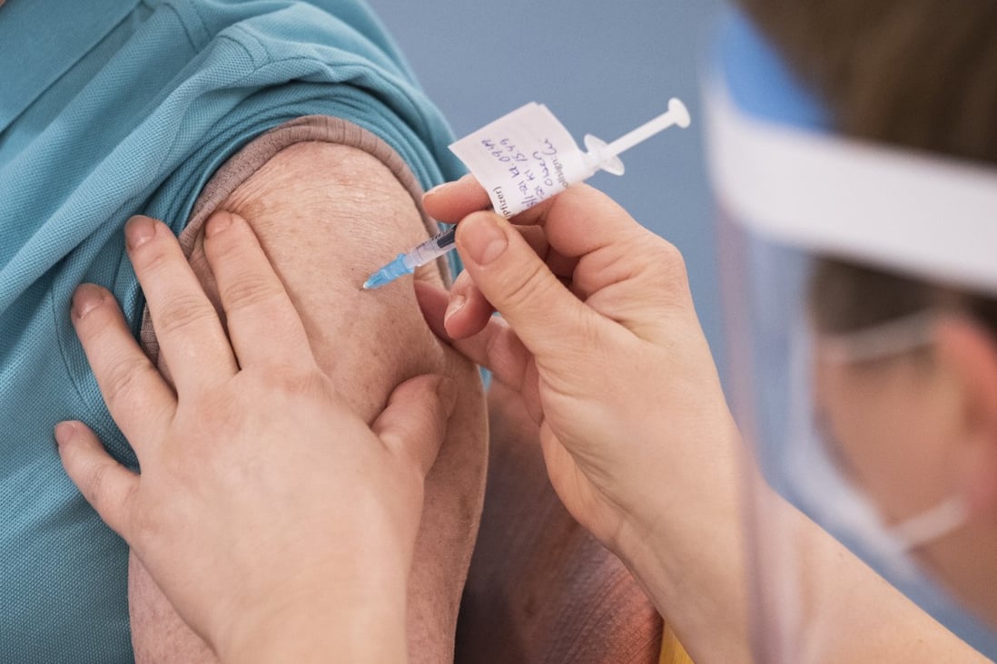 An elderly person is vaccinated with the Pfizer BioNTech Covid-19 vaccine at a nursing home in Norway. Photo: EPA-EFE