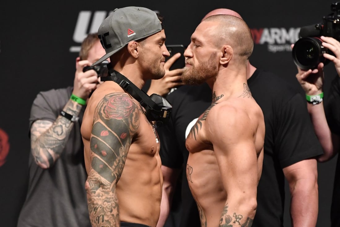 Dustin Poirier (left) and Conor McGregor face off during the UFC 257 weigh-in at Etihad Arena. Photos: Jeff Bottari/Zuffa LLC