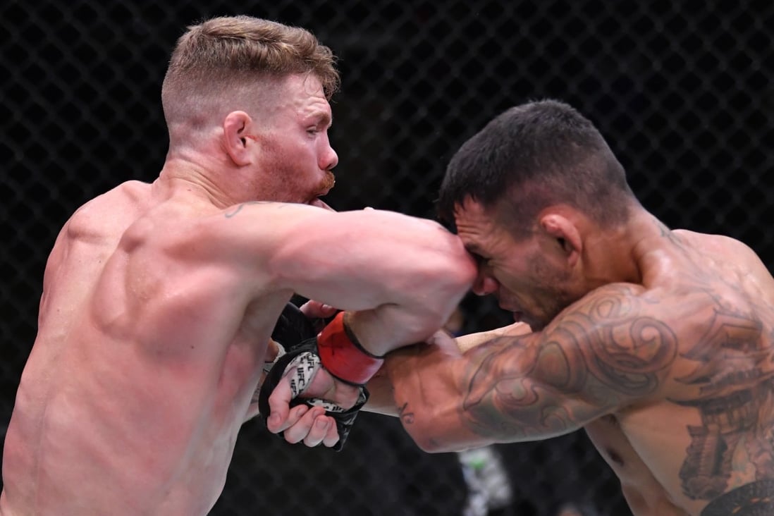 Paul Felder (left) elbows Rafael Dos Anjos in their lightweight fight at the UFC Apex on November 14, 2020 in Las Vegas. Photos: Jeff Bottari/Zuffa LLC