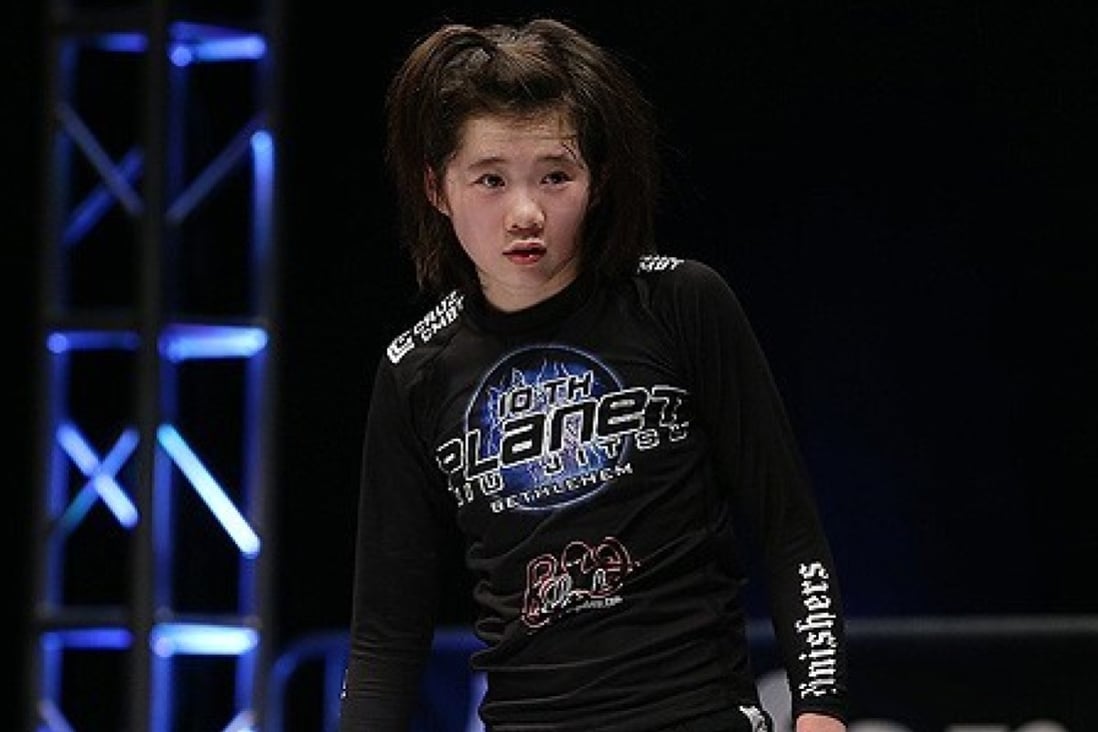Chinese-born Grace Gundrum became the youngest American female to receive a jiu-jitsu black belt in July 2020. Photo: Handout