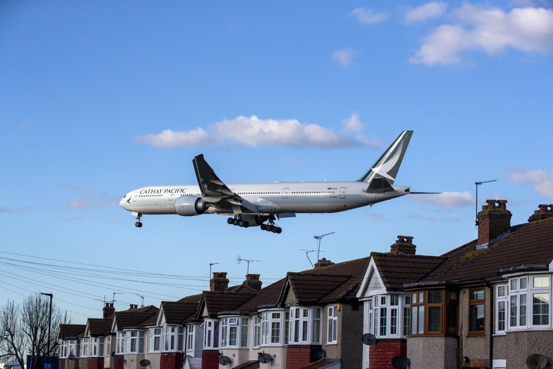 A Cathay Pacific plane comes in to land at Heathrow airport in London. Photo: Getty Images