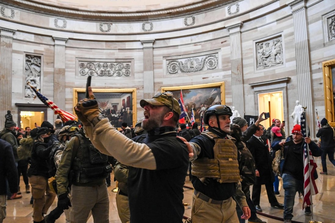 Supporters of then-US president Donald Trump enter the US Capitol’s Rotunda on January 6 in Washington. Photo: AFP