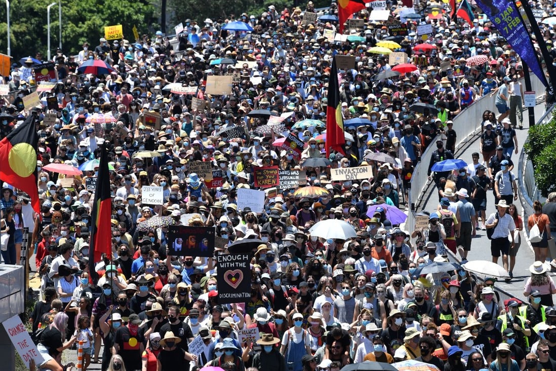 Protesters take part in an ‘Invasion Day’ rally in Brisbane on Tuesday. Photo: AFP