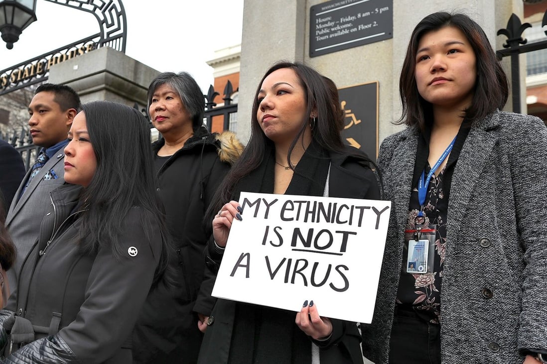 Asian-Americans protest in Boston against racism, fearmongering and misinformation aimed at Asian communities amid the pandemic. Photo: AP