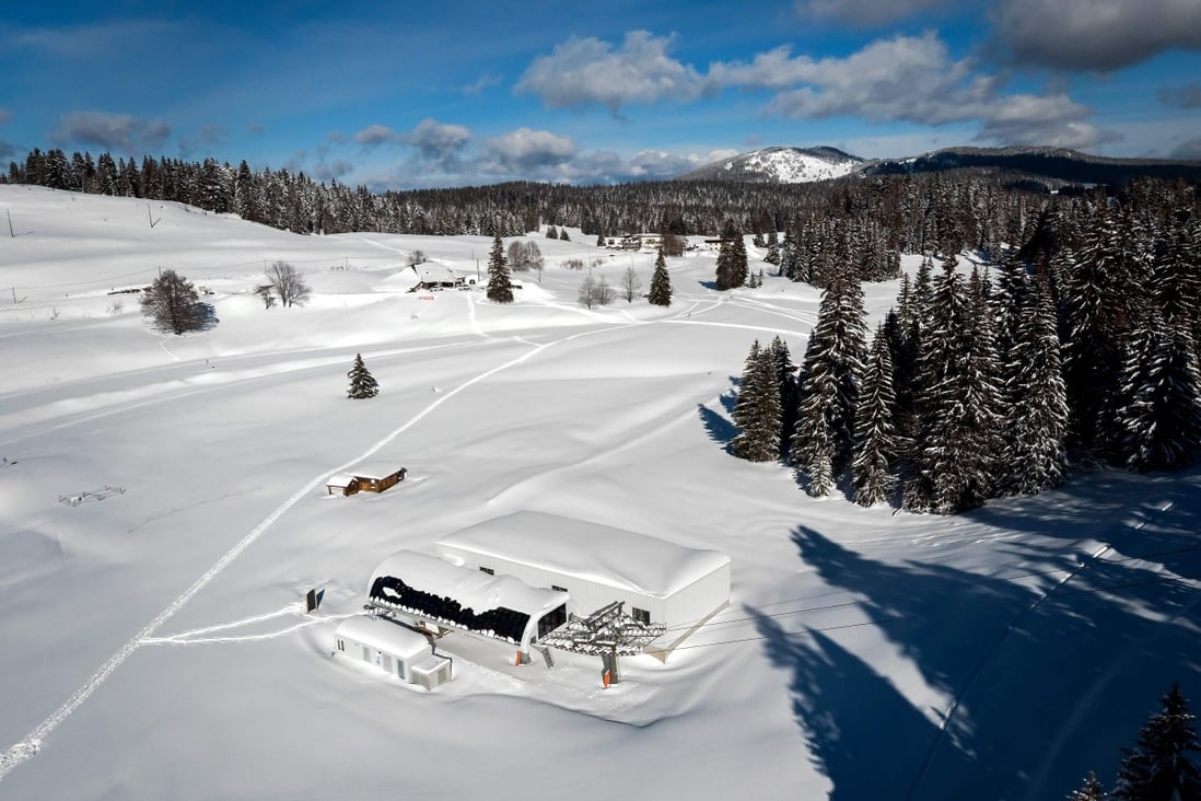 The snow-covered car park at the centre of a dispute between France and Switzerland. Photo: AFP